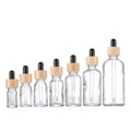 5ml 10ml 15ml 20ml 30ml 50ml 100ml Bamboo Dropper Cap Glass Clear Essential Oil Glass Bottles