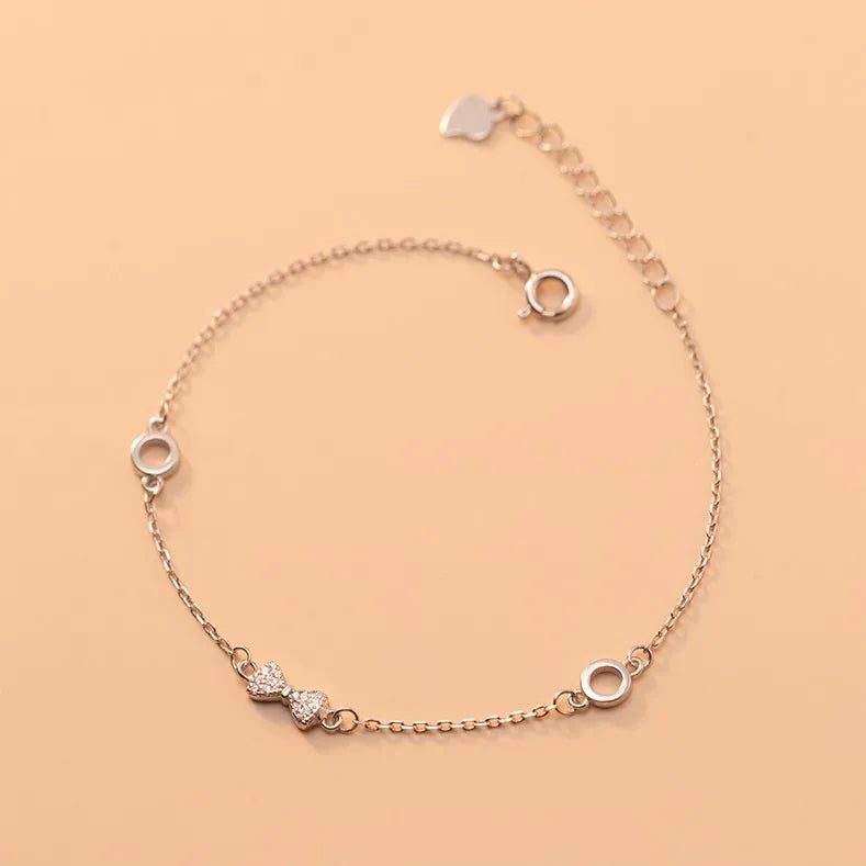 Fashion 925 Sterling Silver Small Cubic Zirconia Bow Knot Shape Hand Charm Bracelets Jewelry for Women