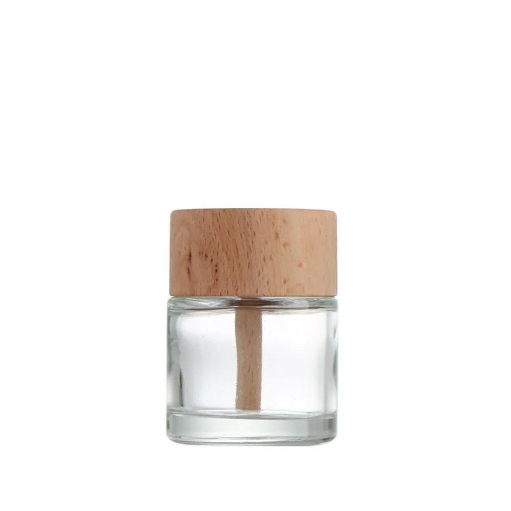 Wholesale 50ml Solid Wood Lid Aromatherapy Bottle clear Thick Bottom Glass Essential Perfume Diffuser with Wooden Stick Cover
