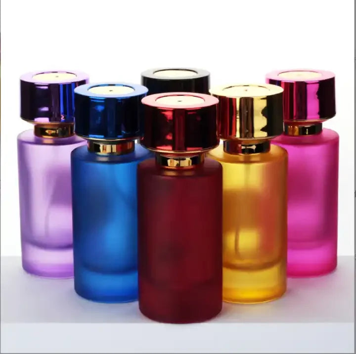 Wholesale Cylindrical Colorful Frosted Fancy Pump Sprayer Fragrance Glass Refillable 30ml 50ml Empty Luxury Perfume Bottle