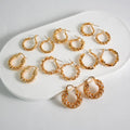 New Fashion Stainless Steel Circle Hollowed Out Earrings Design Sense Twist Versatile Earrings for Women