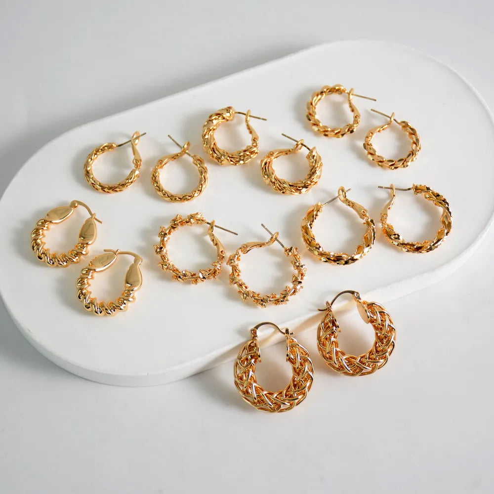 New Fashion Stainless Steel Circle Hollowed Out Earrings Design Sense Twist Versatile Earrings for Women