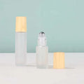 High Quality Essential Oil Bottle Glass Roller Bottles Frosted Glass Bottle Wood Grain Lid