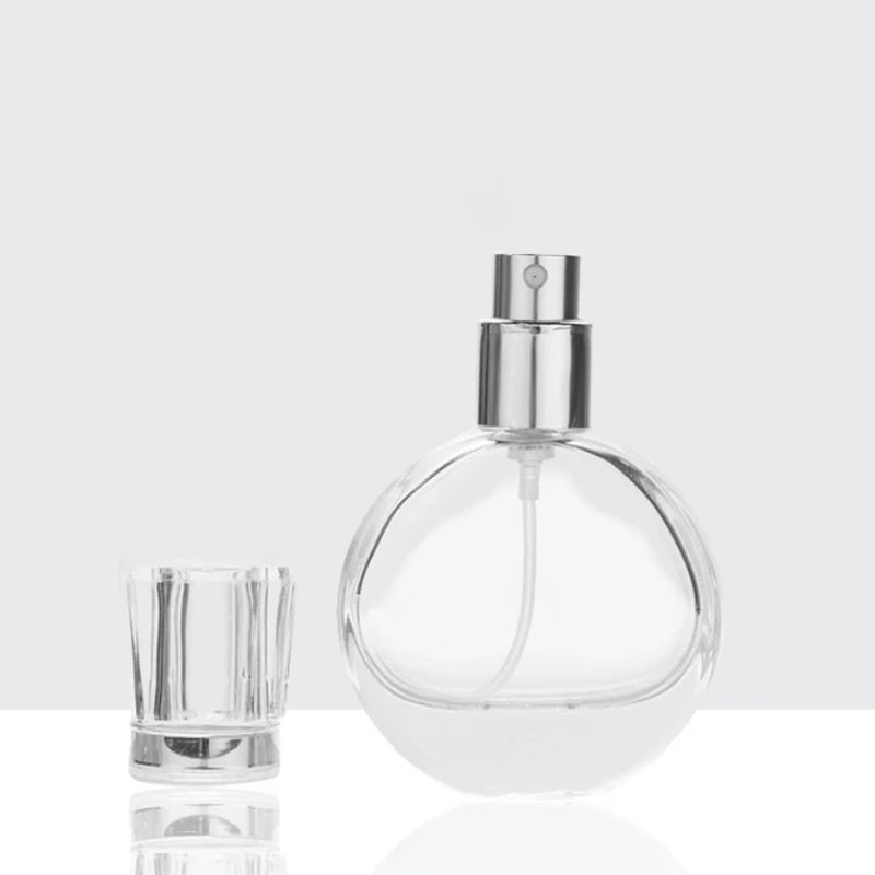 China Manufacturer 25ml Custom Fancy Luxury Glass Perfume Bottles Round Perfume Bottle with Cap