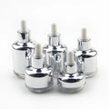 Custom Logo High-End Luxury Glass Dropper Bottle 20ml to 60ml Capacities Silver Shoulder Cover with Roll Cap Cosmetic Packaging