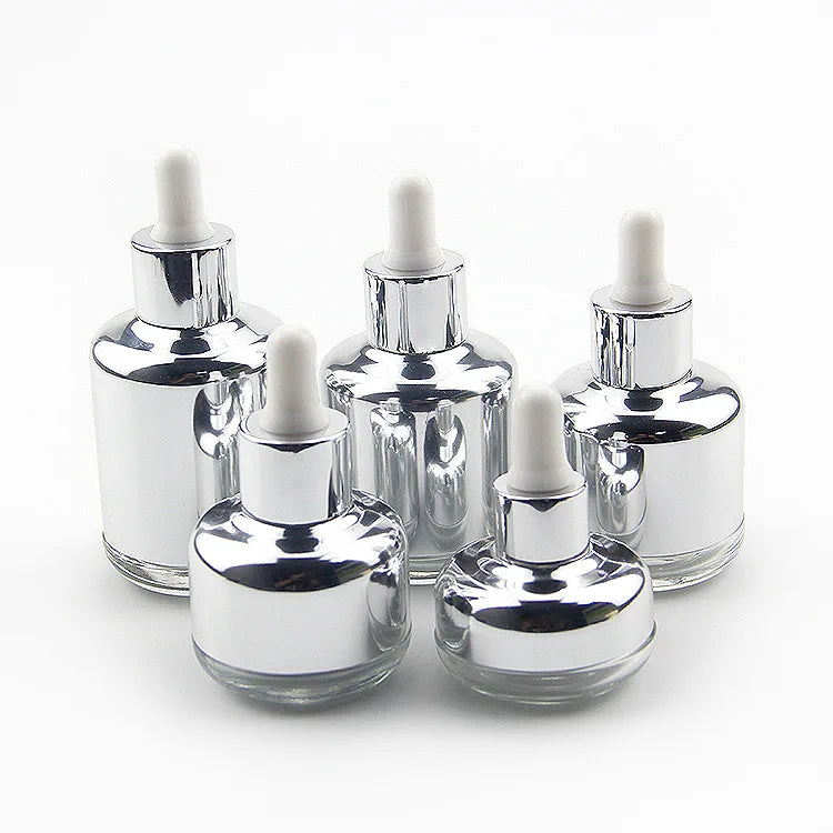 Custom Logo High-End Luxury Glass Dropper Bottle 20ml to 60ml Capacities Silver Shoulder Cover with Roll Cap Cosmetic Packaging