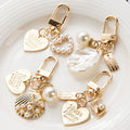 Hot Sale Fashion Shell Metal Gold-plated Keychain Bag Keychain Decoration Custom Artificial Pearl Jewelry Gift Giving