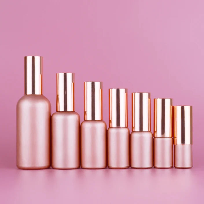 Wholesale New Design Empty Round pink Rose Gold Frosted Fine Mist Refillable Perfume 100ml Glass Spray Bottle