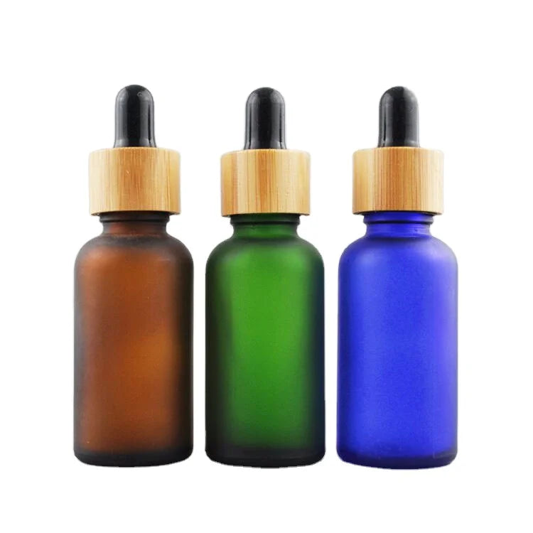 5ml 10ml 15ml 20ml 30ml 50ml 100ml Frosted Amber Blue Green Glass Essential Oil Bottle with Bamboo Pipettes Dropper Cap