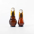 Wholesale Essential Oil Dropper Bottles 50ml Amber Gourd Shape Glass Essential Oil Bottle with Dropper