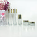 Cosmetic Empty 40ml 120ml 30g 50g clear Skincare Set Glass Packaging for Cream Lotion with Gold Lid