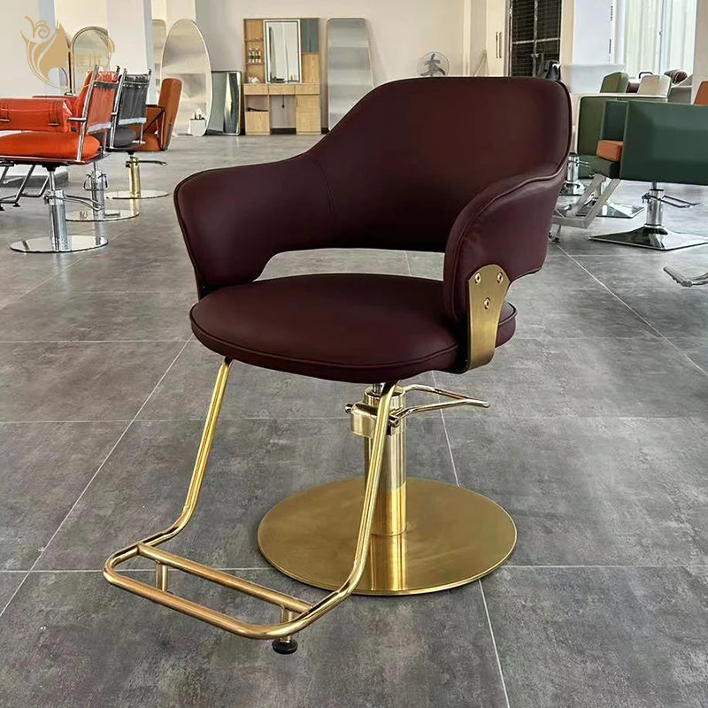 Elegant Salon Chair with Gold Metal Base and Padded Armrests for Hairdressing