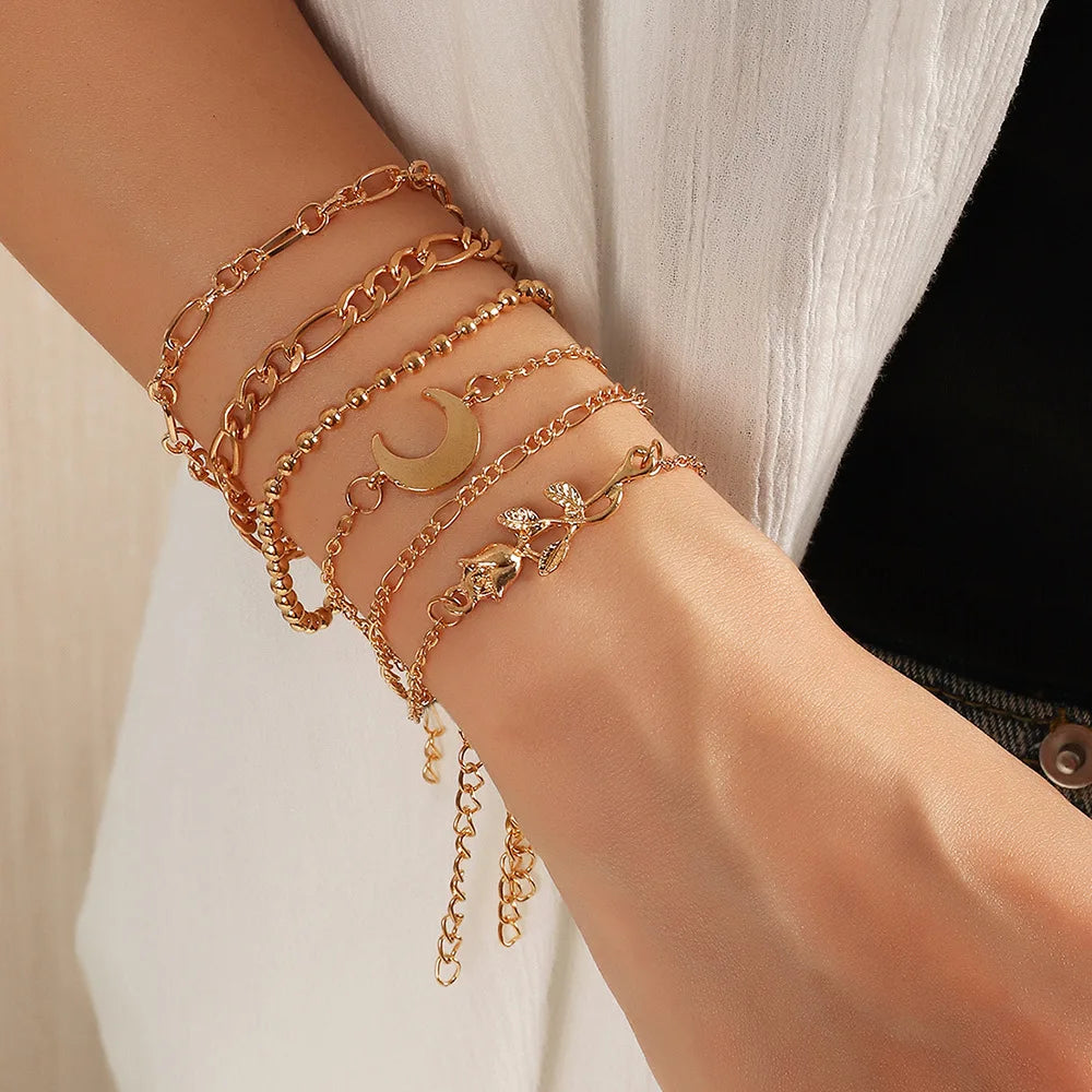 HOVANCI 18k Gold Plating Beads Figaro Chain Bracelet Set 7 Multi Layered Gold Moon Rose Flower Bracelet