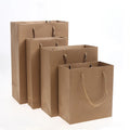 Customized Design Printed Kraft Paper Bags with Handles for Clothing and Shoes
