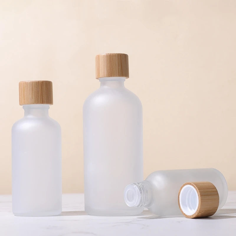 High-quality Empty 5ml 10ml 15ml 20ml 30ml 50ml 100ml Clear Frosted Essential Oil Glass Bottle with Bamboo Lid