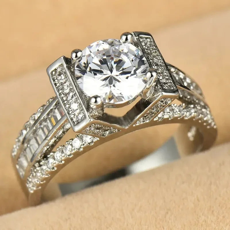 Huitan OEM Luxury Dazzling Imitated Diamond Hollow Band Rings Wedding Party Elegant Silver Plated Cubic Zirconia Rings for Women