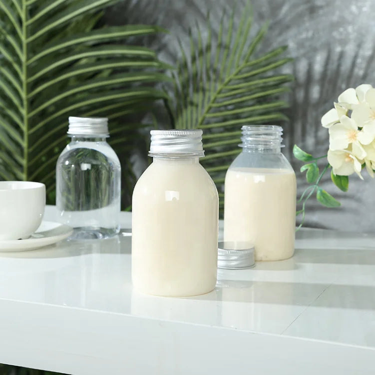 Hot sale mini portable 250ml round milk bottle plastic packing with custom logo