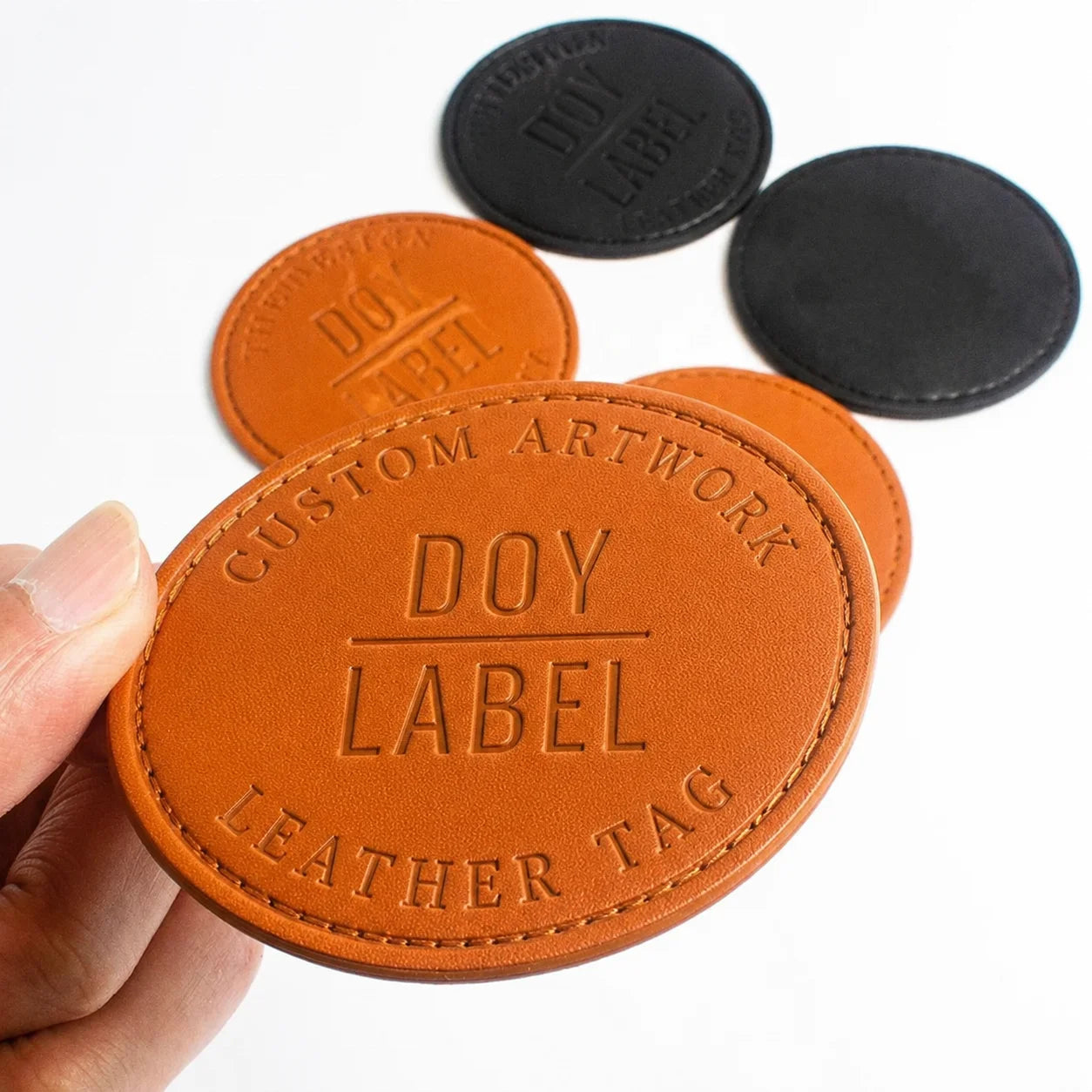 Supplier Custom Debossed Logo Sew on Hat Badges Tags Genuine Leather Patches for Garments