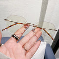 Good Quality Clear Large Size Women Rimless Cut Edge Glasses Metal Temple Round Anti Blue Light Blocking Optical Spectacles