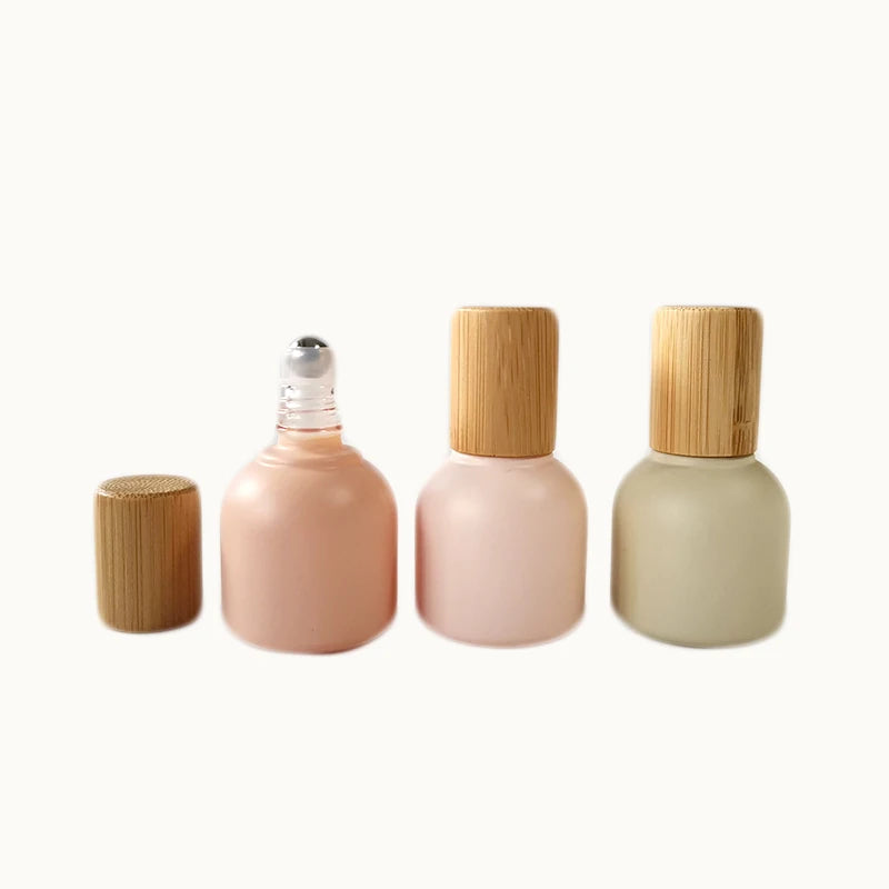 High-End 10ml Morandi Color Glass Roll-on Bottle New Design with round Shape Metal Roller and Bamboo Lid