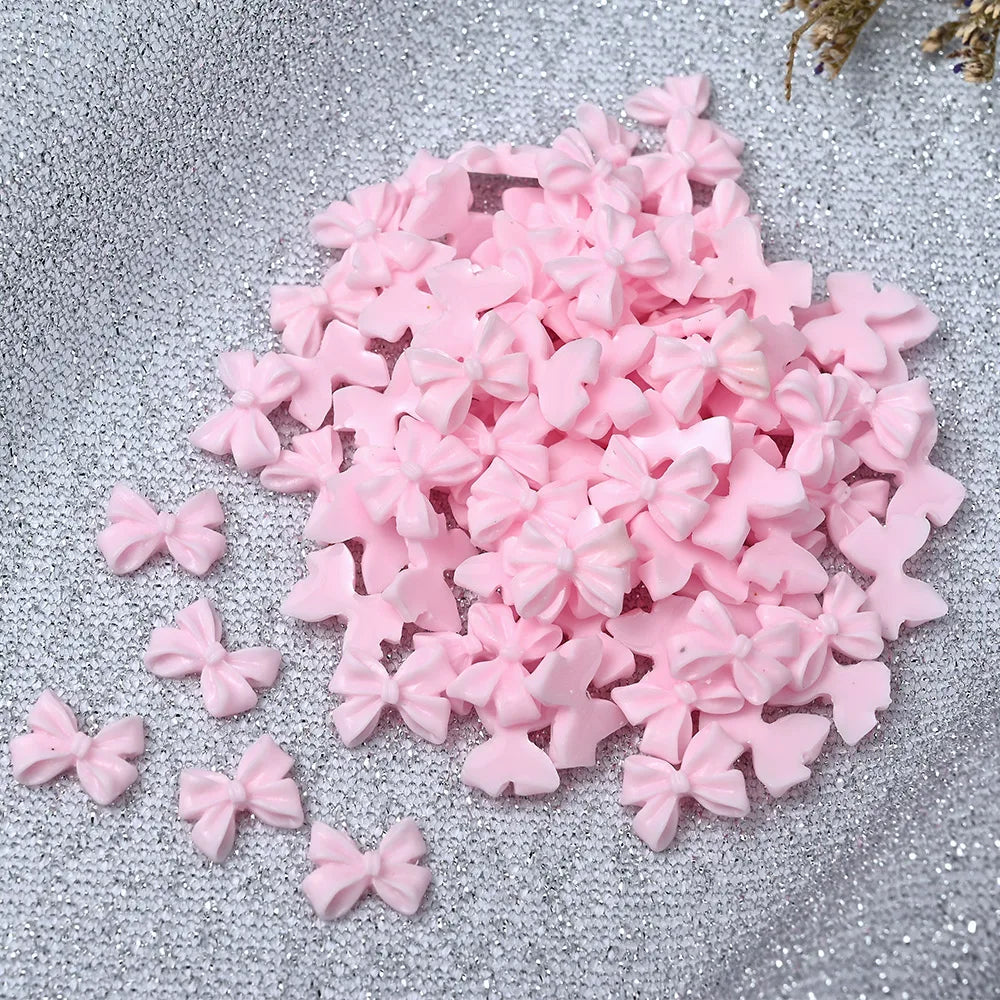 100pcs/Bag Kawaii Bowknot Nail Art Charms Lovely Fairy Resin Ribbon Bow Nail Decoration Flatback Bowtie Nail Rhinestones