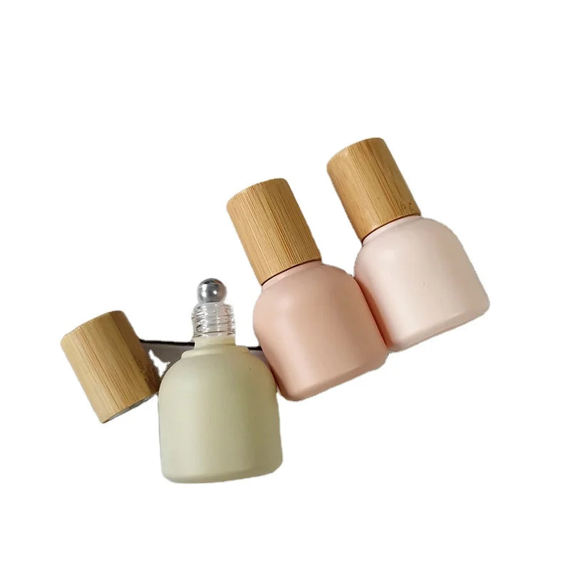 Small Travel Size 10ml Roll-on Glass Essential Oils Bottle round Shape with Steel Roller and Bamboo Cap Special Design