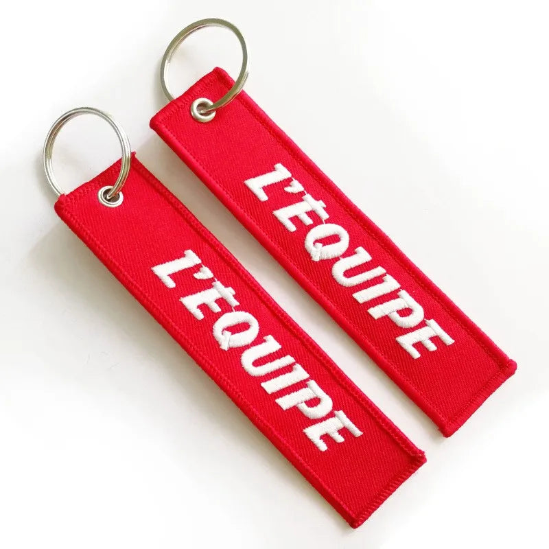 Custom Promotional Logo Cars Remove Before a Flight Crew Double Sided Embroidery Woven Fabric Embroidered Key Jet Tag Keychain