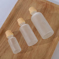 Wholesale Wood Cap Black 50ml Lotion Pump Bottles for Cosmetic Packaging Bottle Set with Glass Matte Cosmetic Packaging