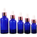 5ml 10ml 15ml 20ml 30ml 50ml 100ml Clear Blue Cosmetics Custom Round Glass Dropper Essential Oil Bottle