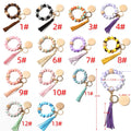 2025 New Design Wholesale Bead Bracelet Wooden Bead Wrist Keychain  Leather Tassel Keyring Silicone  Wristlet Keychain