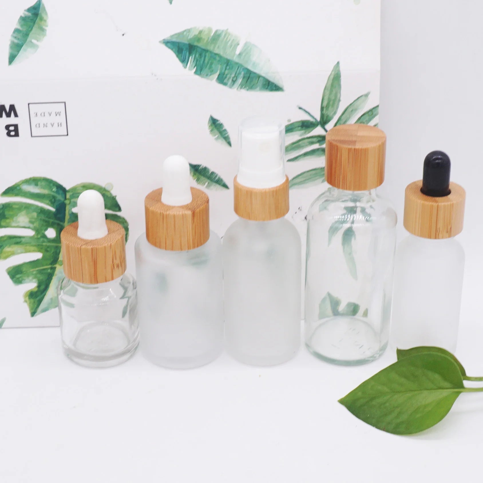 30ml clear Frosted  Eco Friendly  Glass Serum Pump Bottle 50ml  with Bamboo Lid
