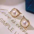 Devil's Eye Earrings 7.5-8MM Natural Round Pearl Earrings High Quality Steamed Bun Style