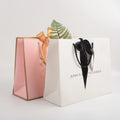 Custom Logo Cardboard White Pink Kraft Paper Retail Business Cloth Shopping Black Gift Boutique Paper Bag with Cotton String Han