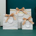Wholesale Custom Drawstring White Marble Paper Bag Shopping Gift Bags Packaging With Ribbon