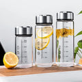 Wholesale Kids Portable Transparent 15oz Glass Water Bottle Removable with Protective Sleeve Steel Lid Custom Logo Applicable