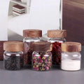 Eco-Friendly 100ml/200ml Kitchen Glass Spice Jars Set Wooden Acacia Screw Lid Handmade 4oz/6oz Custom Logo Engraving for Travel