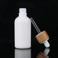 50ml 200ml White Porcelain Bottles and Jars with Wooden Lid for Liquid Cosmetic Packaging