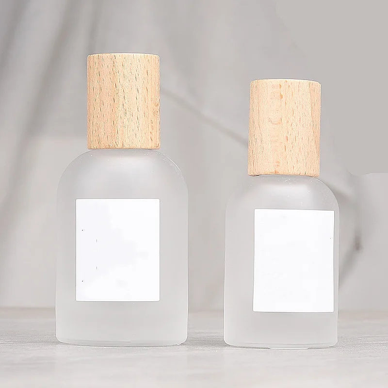 Wood Cap clear Frosted Glass Spray Bottle Thick Bottom Empty 30ml 50ml Screw Refill Private Label Glass Spray Bottle for Perfume