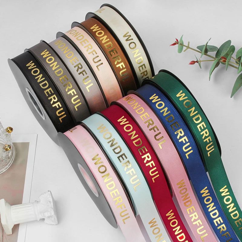 Good Quality Customized Logo 1inch 25mm 100% Polyester High Tenacity Gold Foil Printed Floral Pattern Single Face Gift Ribbon