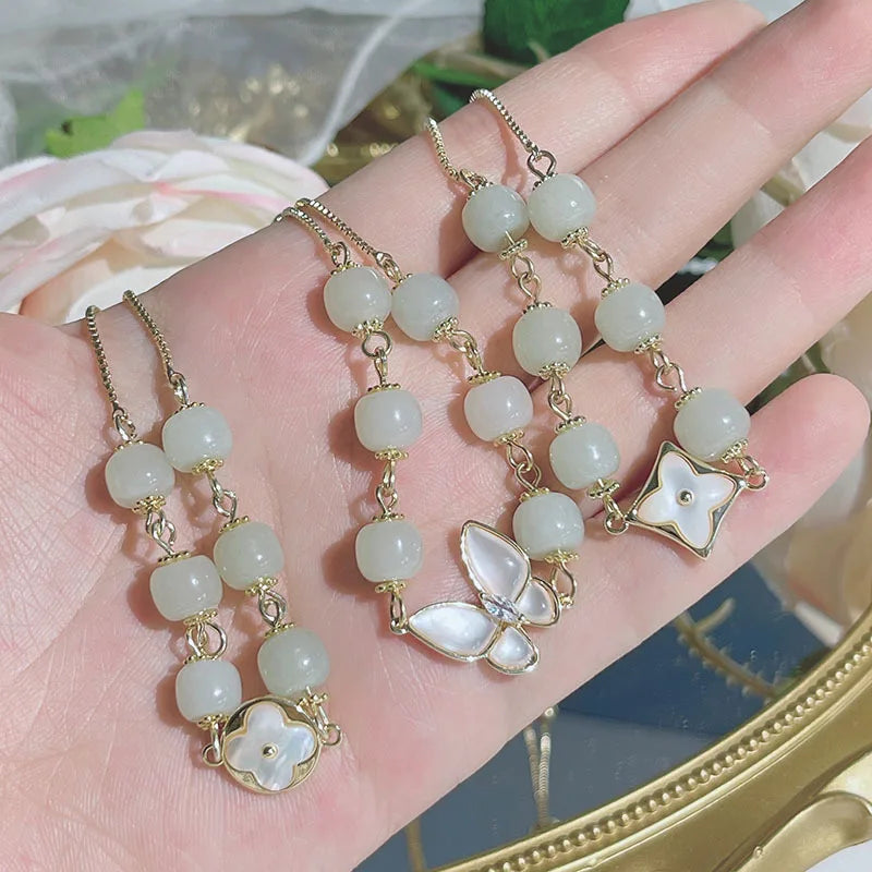 High Grade Natural Jade Hetian Jade Beaded Shell Charm Stretch Adjustable Bracelet Lucky Four Leaf Butterfly Bracelet for Women