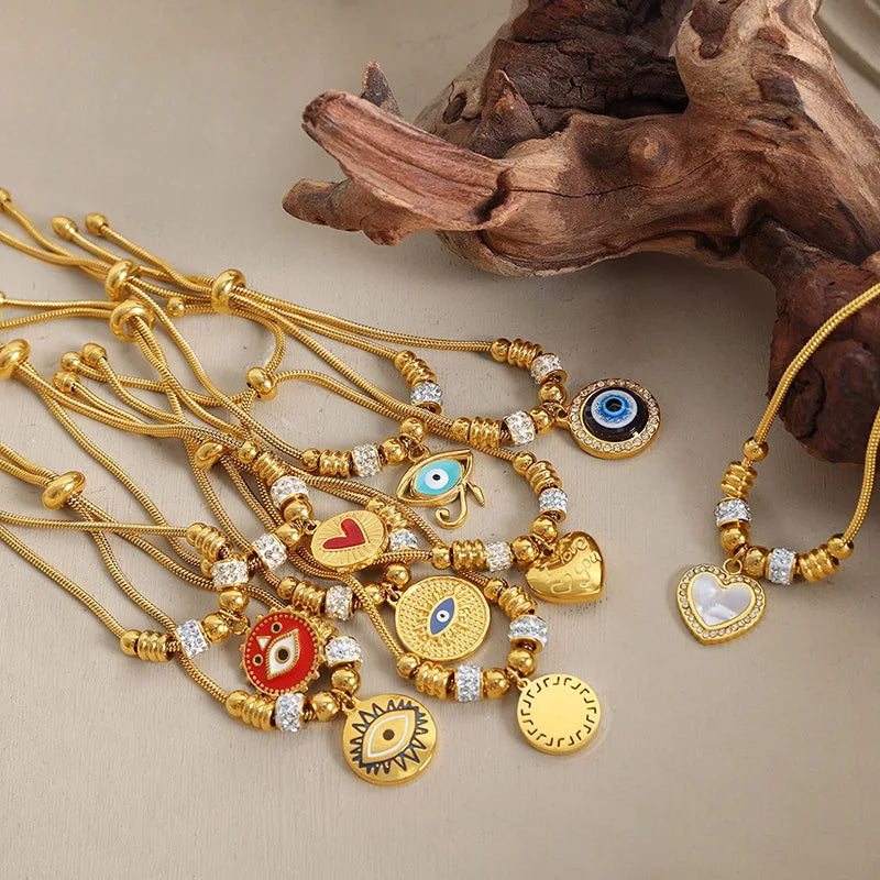 High End 18K PVD Gold Plated Stainless Steel Snake Chain Enamel Crystal Eye Heart Pendant Bracelet for Women Wholesale Jewelry