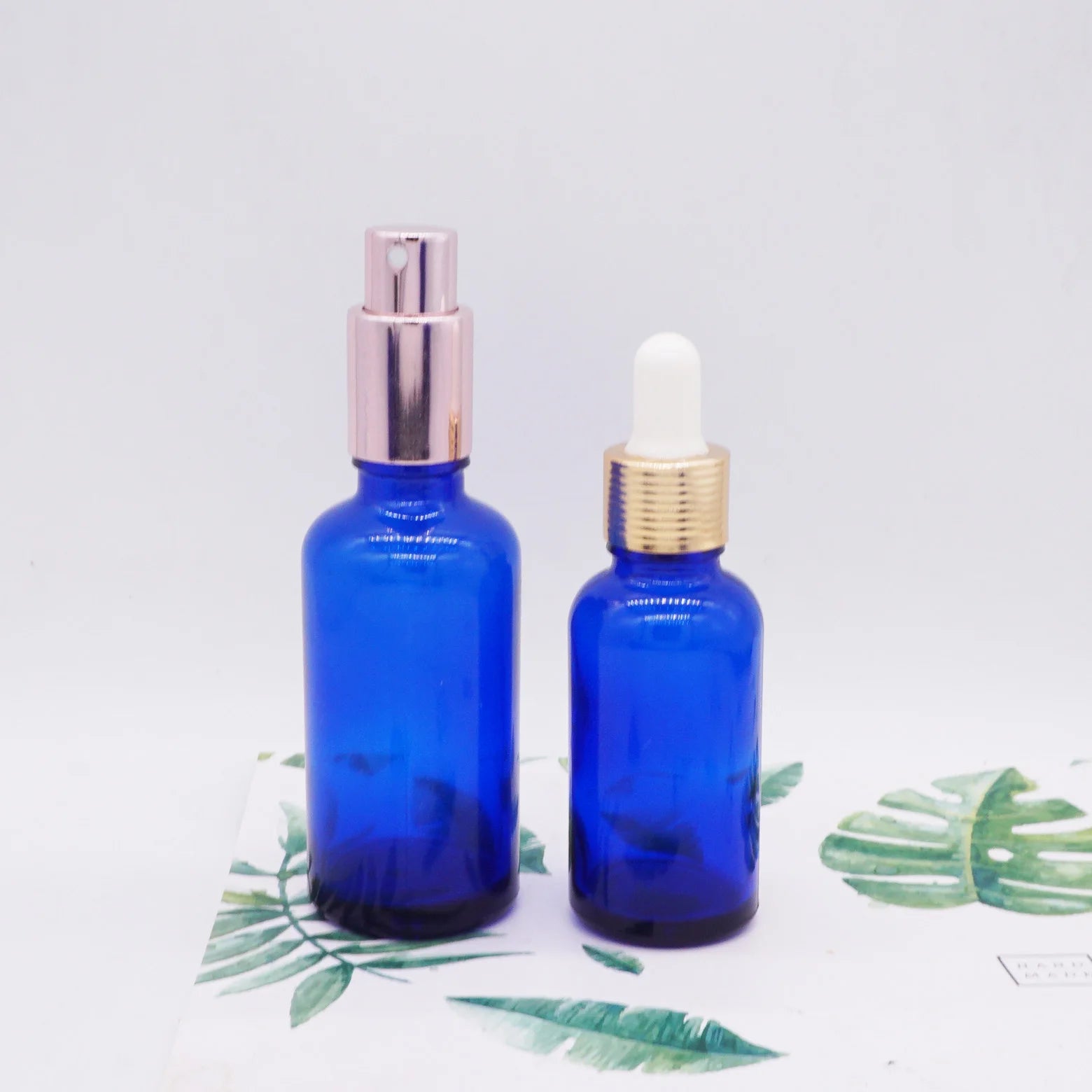 30ml 1oz Cobalt Blue Glass Oil Bottle with Rose Gold Lid for Skin Care Serum