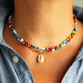 Bohemian Shell Pendant Necklace Beach Cowrie Seashell Puka Shell Choker Necklace Colorful Beaded Necklace for Women and Girls
