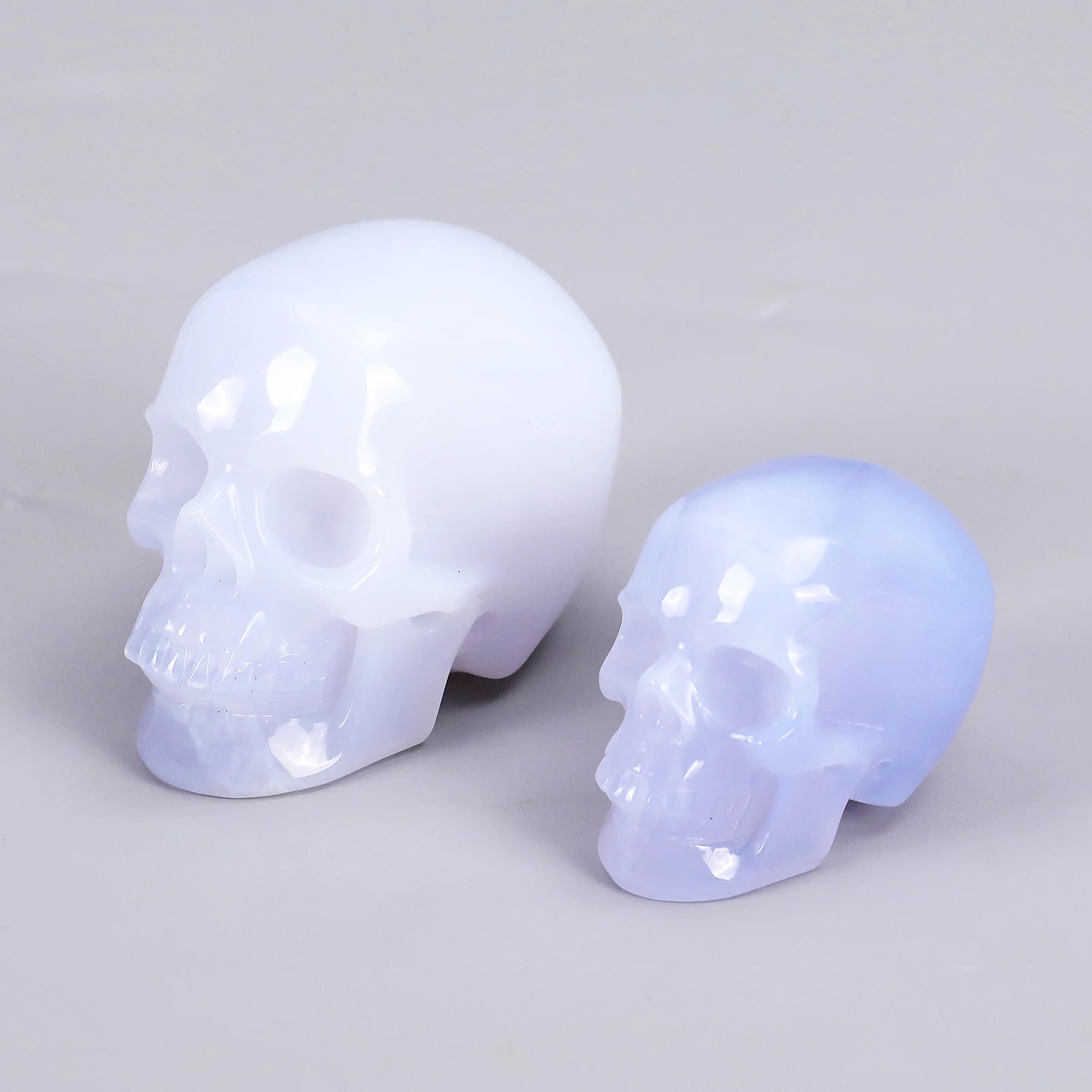 High Quality Natural Blue Chalcedony Skull Hand Carved Gemstone Crystal Skulls Bones Fine Art Sculpture for Home Decoration