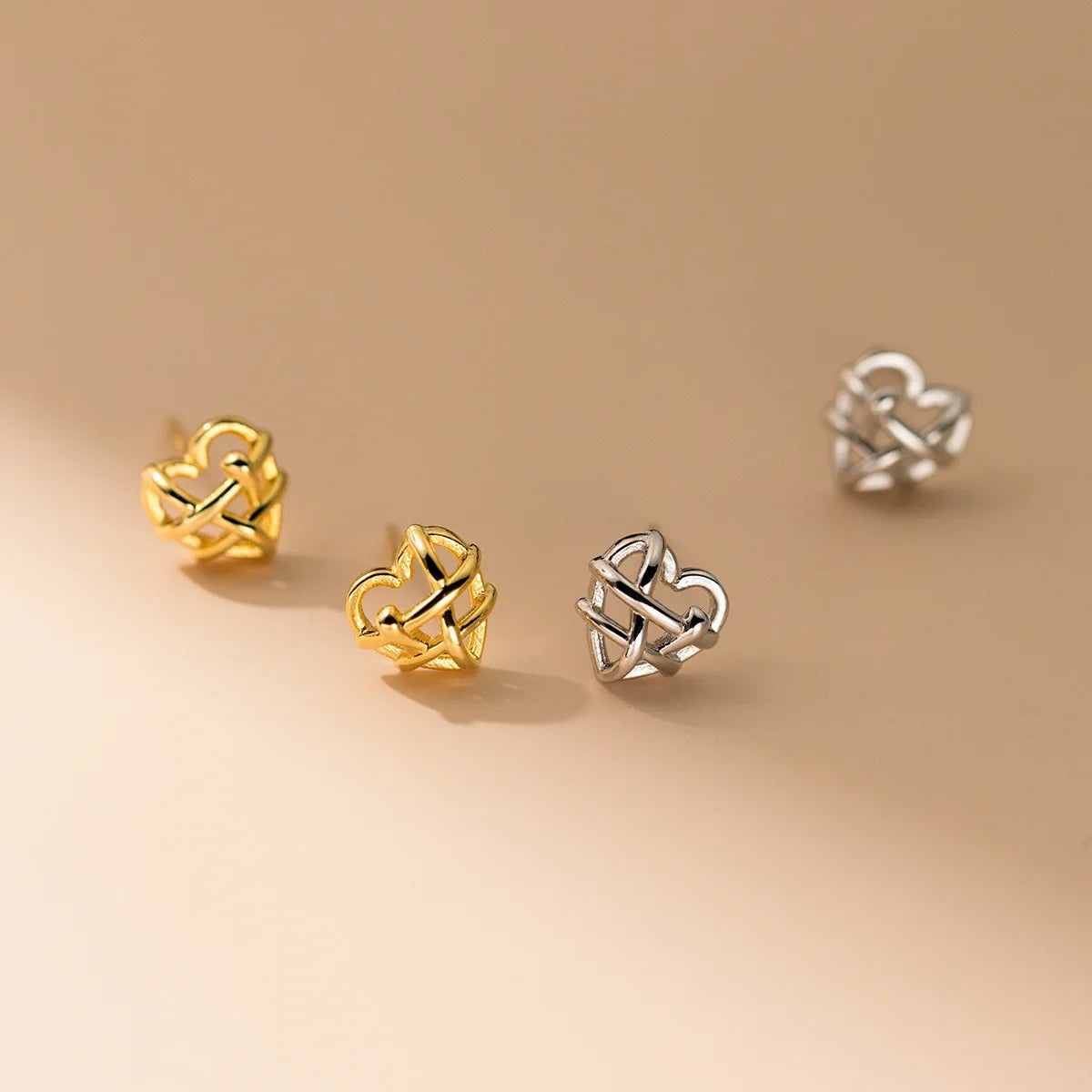 Europe and America Fashion Jewelry 925 Sterling Silver Braid Hollow Out Heart Gold Plated Stud Earring Jewelry for Women