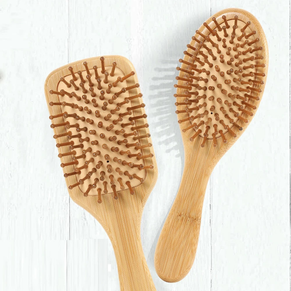 Wholesale Customizable Comfortable Natural Bamboo Portable Classic Hairbrush Wooden Paddle Hair Comb with Handle for Massage