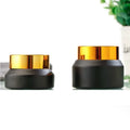 In Stock Empty Cosmetics Gel Container 15ml 30ml 50ml Matte Black Cosmetic Packaging Face Cream Glass Jar Bottles With Gold Lids