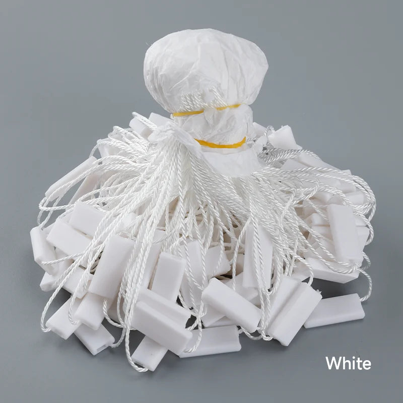 Quick Trade Clothing Hanging Granules 500 Pieces per Pack Plastic Seal Tag for Clothing Labels