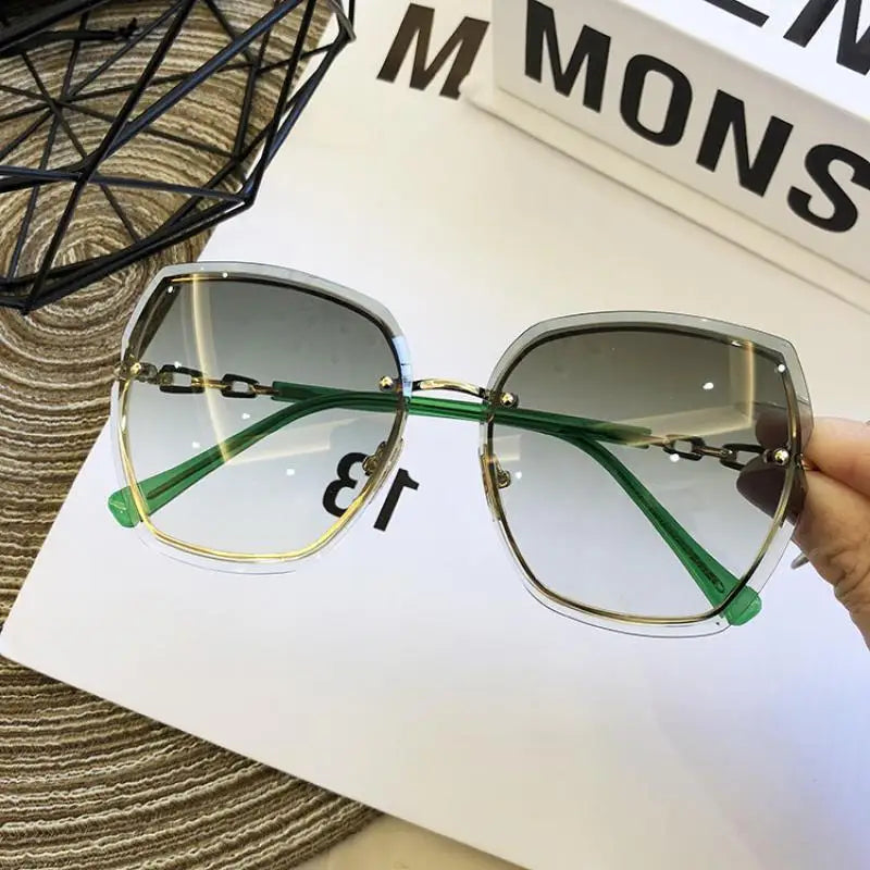 Wholesale Fashion Frameless Sunglasses for Women Rimless Shades Metal Frame Uv400 Eyeglasses
