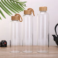 Portable 500ml Bamboo Lid Glass Bottle Sports Water Bottle Drinking Glasses Cup Juice Tumbler Cup Glass Bottle with Bamboo Lid
